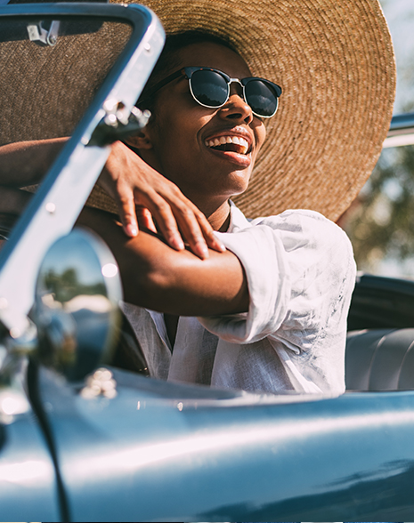 Woman in blue convertible