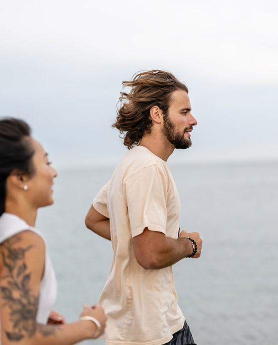 Couple running on the beach