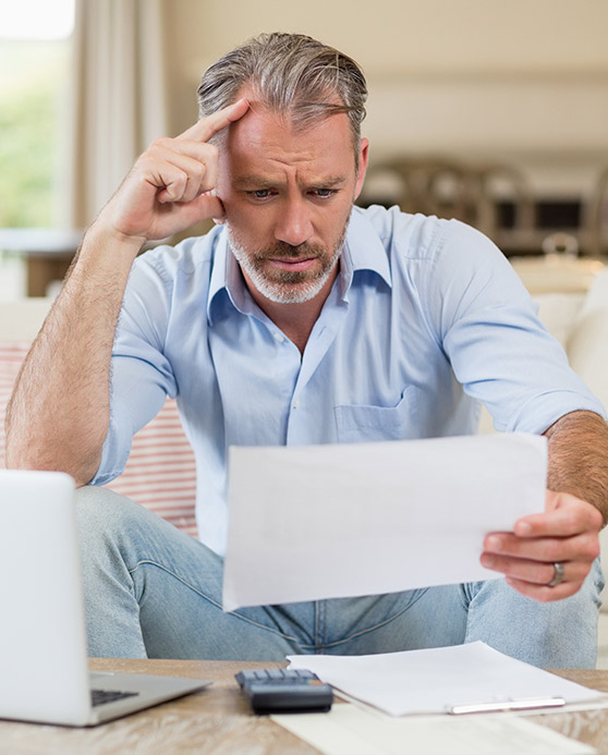 Man working on debt consolidation