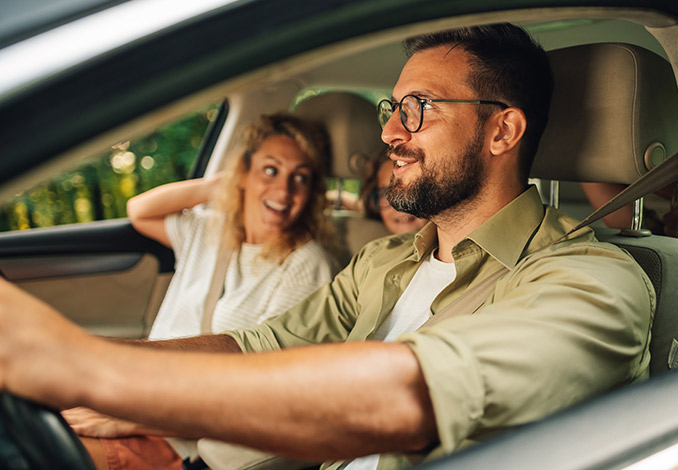Family driving in car