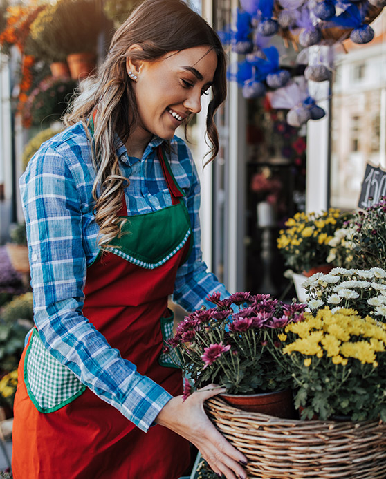 Woman working at a flower business