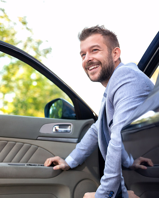 Man coming out of his car